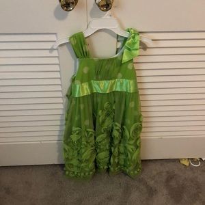 Cute green dress with poka dots and flowers